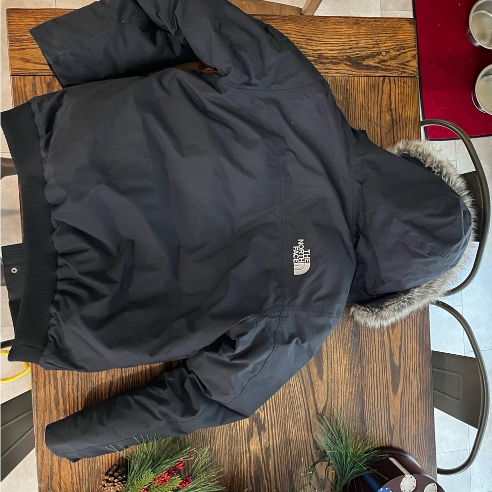 The North Face coat, size large with fur trim around the hood.